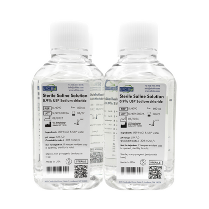 Two bottles of UFC BIO 0.9% Sterile Saline Solution on a white background 